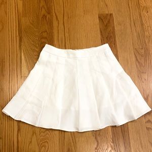 white pleated skirt